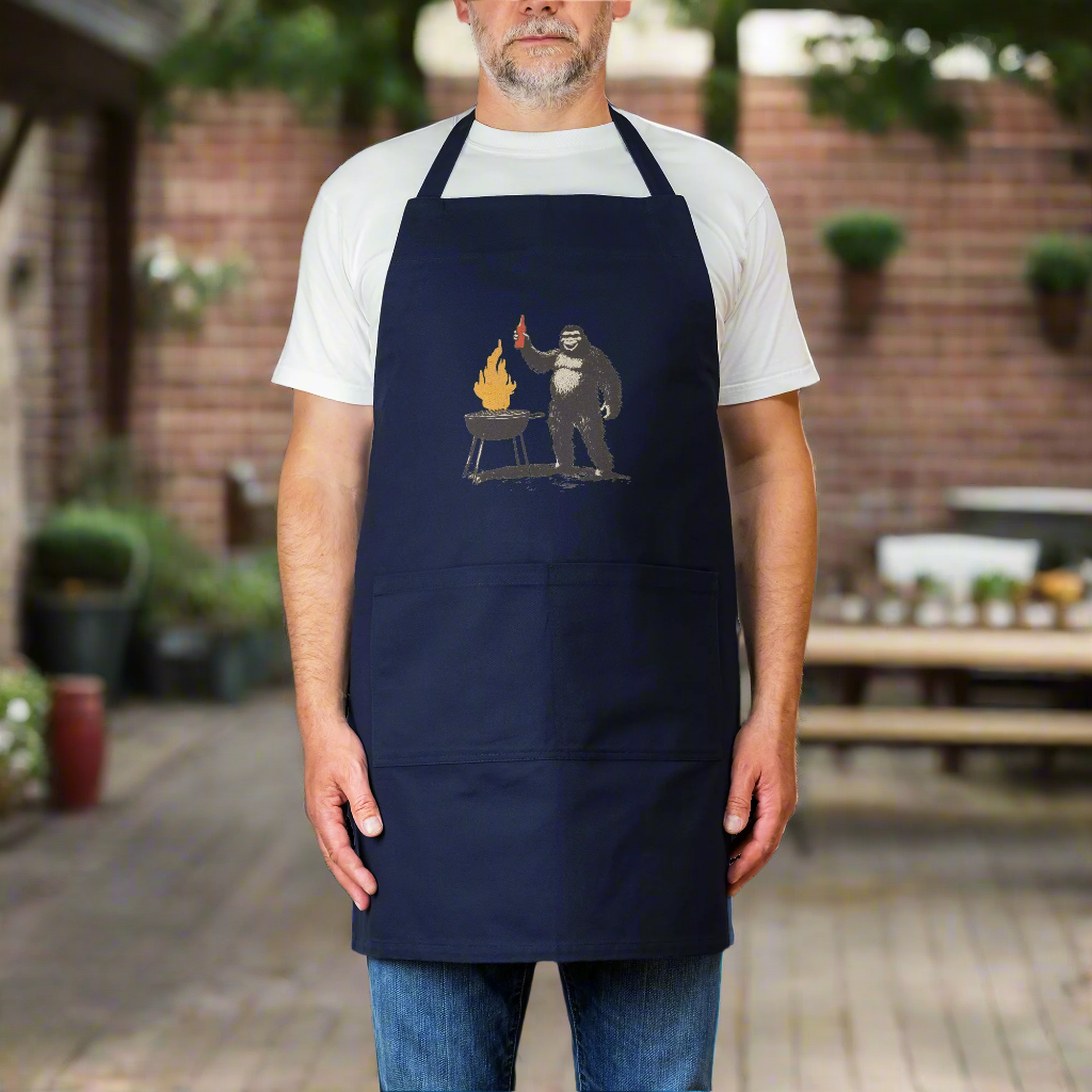 Sasquatch_BBQ_Apron__Heavy_Duty_Cotto_Navy_Model_Mockup.png