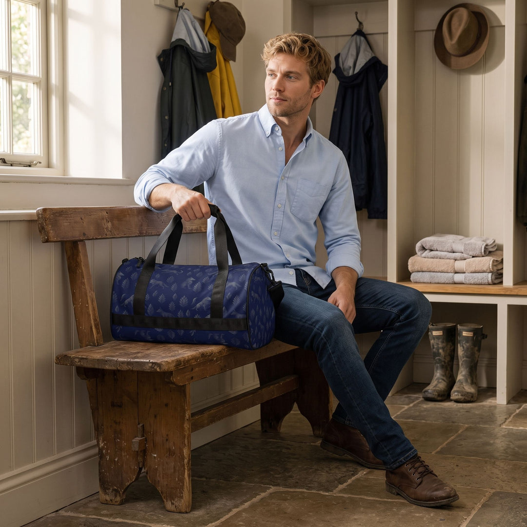 Stylish gym bag with wolves artwork on a table in a warm, cozy room, emphasizing practicality and rugged outdoor spirit.