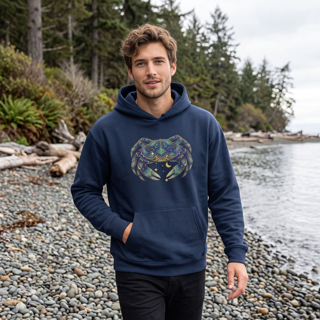 Casual model wearing the Cancer Dungeness Crab hoodie in an outdoor setting with greenery, capturing natural daylight and a relaxed vibe.