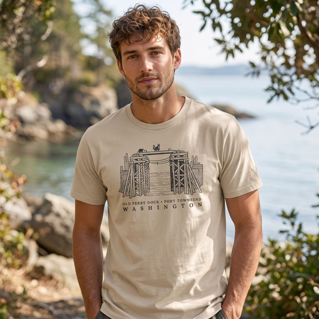 Adult model in relaxed casual style wearing the organic cotton tee outdoors, highlighting the coastal-themed line art and eco-friendly design.