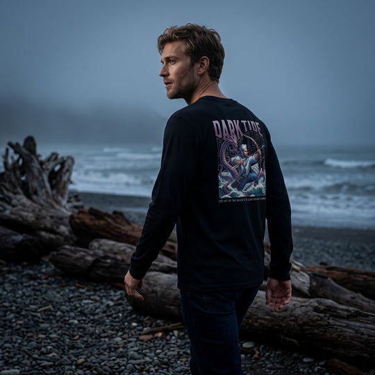 Sailor vs. kraken graphic on a long sleeve shirt with dramatic, cinematic lighting and rich textures.