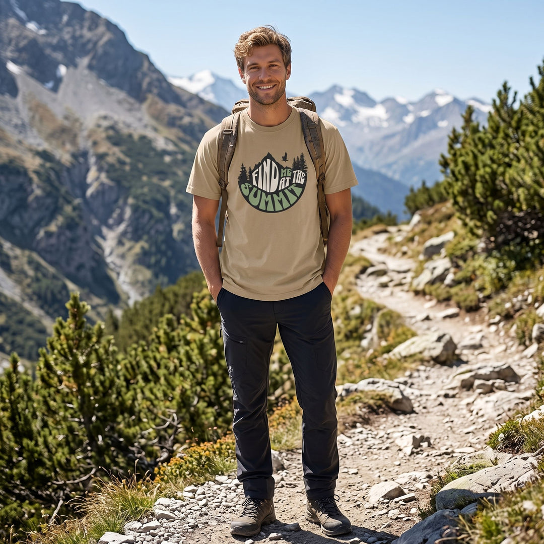 Model Ben wearing a khaki oversized heavy cotton T-shirt with mountain and eagle graphic outdoors.