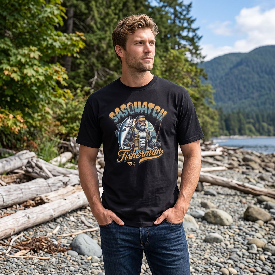 Fisherman Sasquatch heavyweight tee worn outdoors, lush greenery background, casual style with natural lighting.