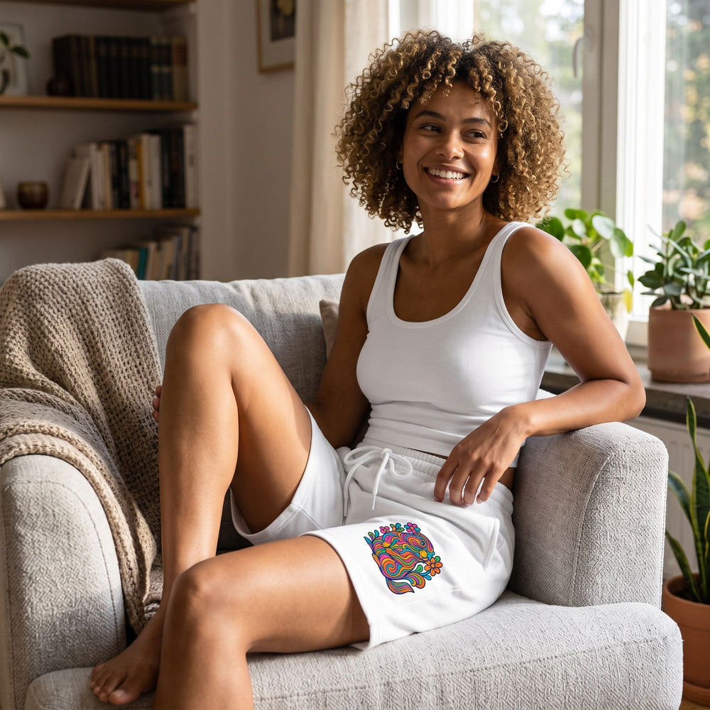 Men's lounge fleece shorts with ring-spun cotton blend fabric, showcased on a model in a cozy indoor space with soft natural lighting.