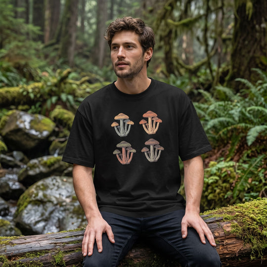 Casual male model showcasing mushroom graphic tee in fresh outdoor environment