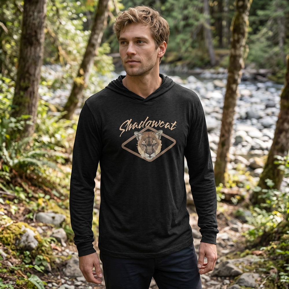 Model Ben in casual outdoor environment wearing The Shadowcat lightweight eco-friendly hooded tee.
