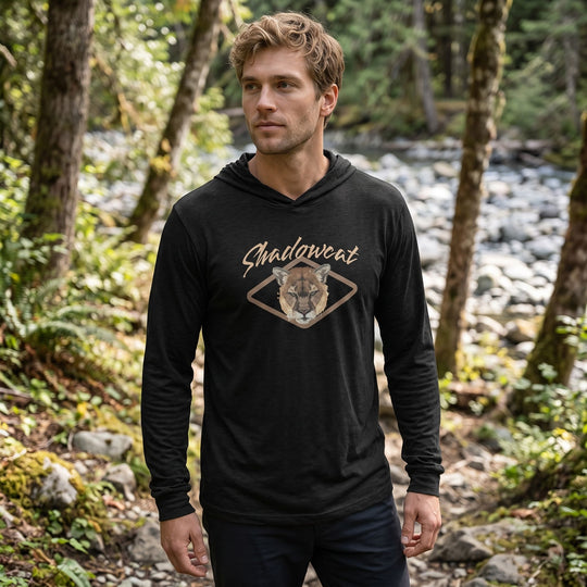 Model Ben in casual outdoor environment wearing The Shadowcat lightweight eco-friendly hooded tee.