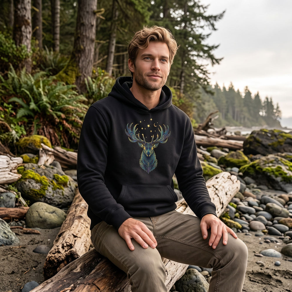 Man wearing Sagittarius Roosevelt Elk fleece hoodie in cozy living room setting, showcasing casual wear and comfort.