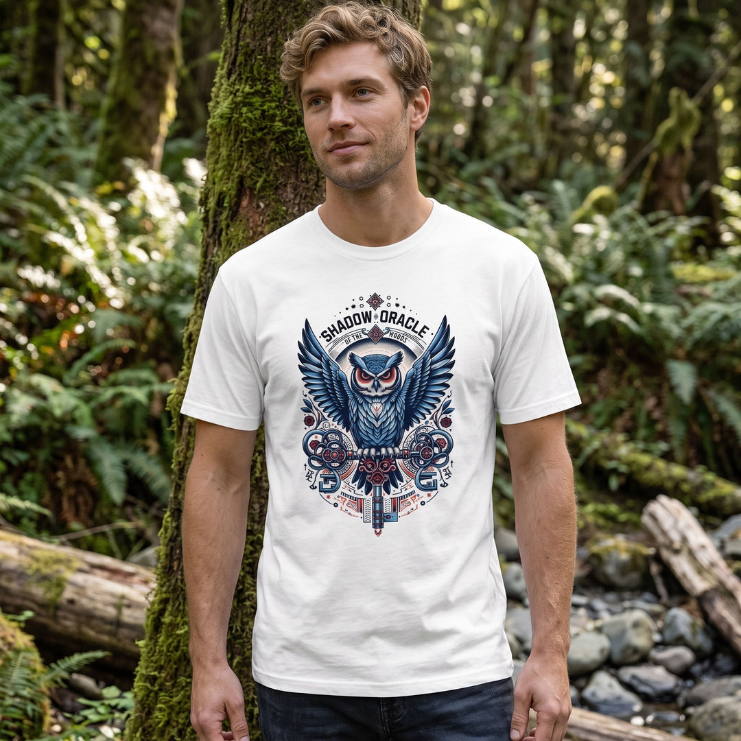 Steampunk owl design T-shirt featuring Shadow Oracle motif in outdoor natural setting with greenery and bright sunlight