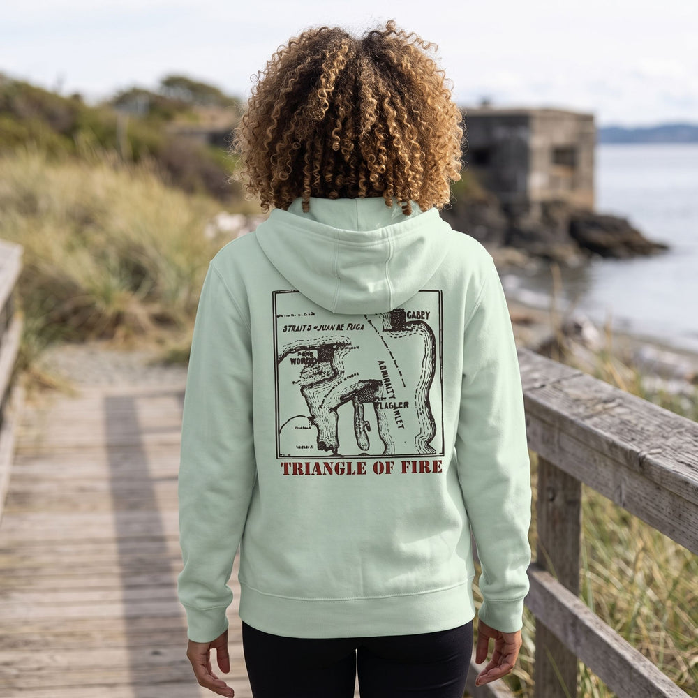 Outdoor zip-up hoodie featuring a vintage military map of Admiralty Inlet and fort defenses, modeled with a natural outdoor background.
