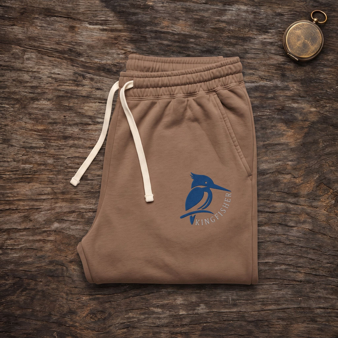 Comfortable relaxed fit sweatpants with ribbed cuffs and a perched kingfisher graphic detail.