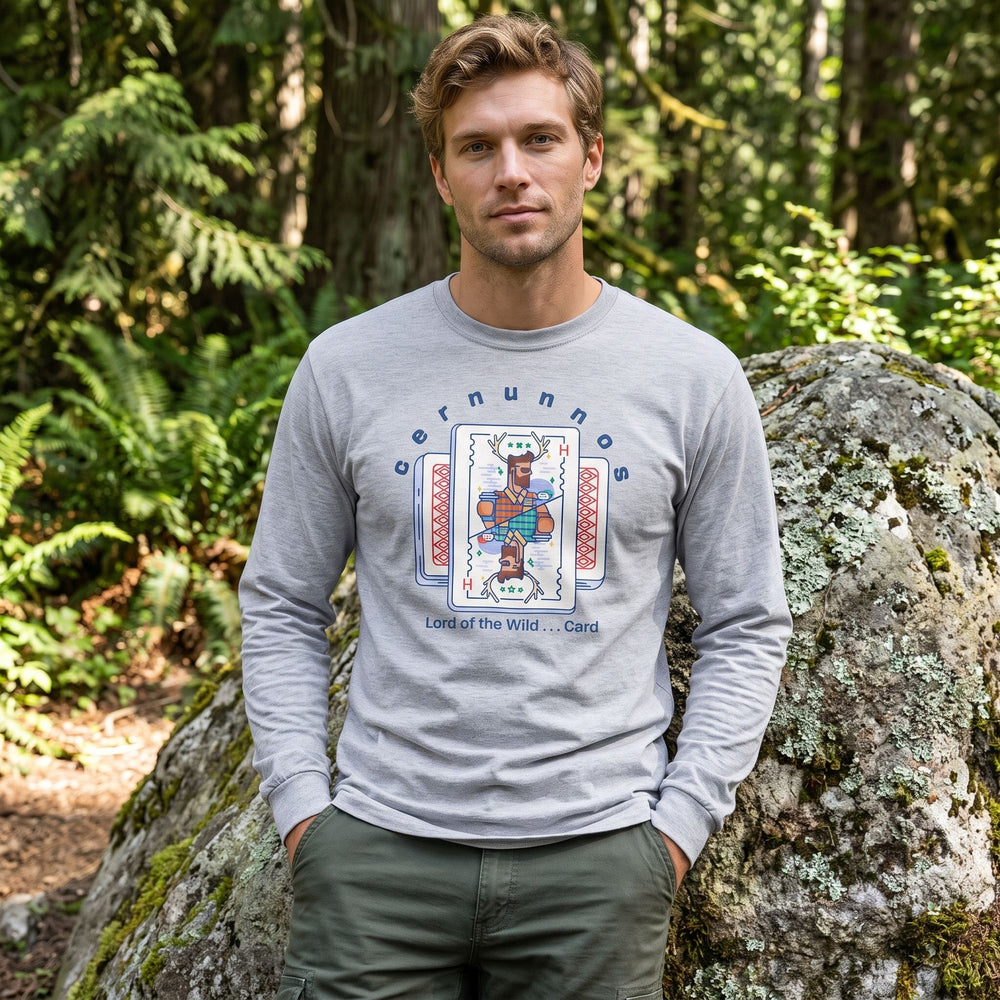 Men's long sleeve T-shirt featuring Cernunnos graphic, outdoors with greenery and natural sunlight, modeled casually.