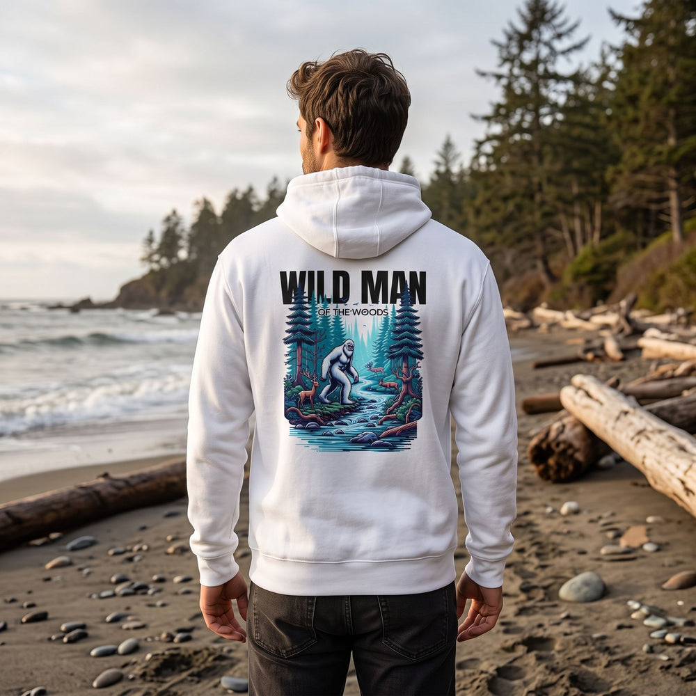 Casual model Alex wearing Wild Man of the Woods Hoodie in a cozy, natural-lit living room setting, showcasing comfort and style.